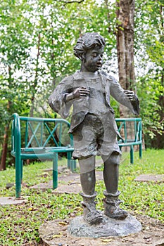Children statue at garden
