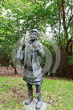 Children statue at garden