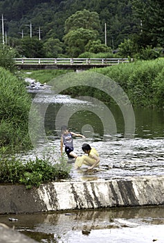 Children in the stream
