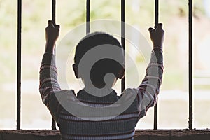 Children are stressed because they are trapped in a steel cage. The concept of violence against children