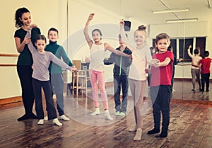 Children studying of partner dance at dance school