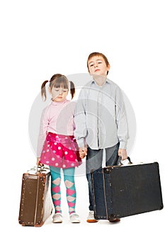 Children with suitcases