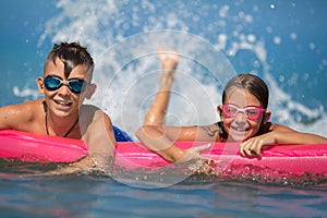 Children swimming and having fun together