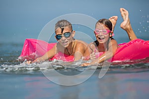 Children swimming and having fun together