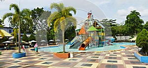 A children swimming pool that has fun rides and is also a beautiful place to visit