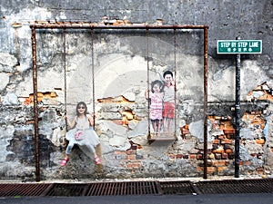 Children on the Swing Street Art Piece in Georgetown, Penang, Ma