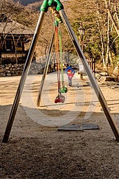 Children swings at wilderness mountain park