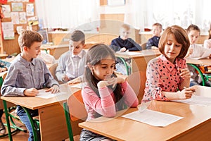 Children taking an exam