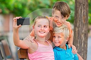 Children are taking selfie
