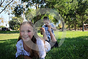 Children with their feet in the air/ being tickled photo