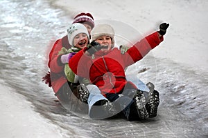 Children tobogganing