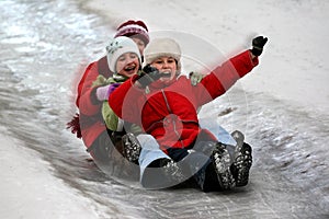 Children tobogganing photo