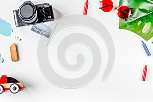 children tourism outfit with toys and camera on white background flat lay mockup