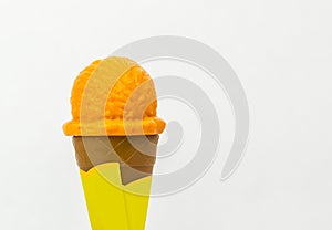 Children Toy, orange ice cream scoop in waffle. Isolate white b