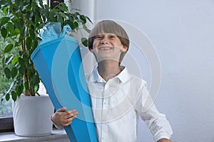 Children with traditional German candy cone on the first day of school. Back to school