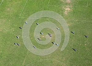 Children train football on a large football field in Velika Gorica, Croatia