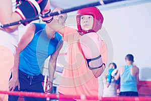 Children training on boxing ring