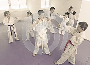 Children training in pairs