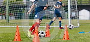 Children Training Soccer on Field. Young Kids Boys kicking Soccer Football Balls on Grass Pitch