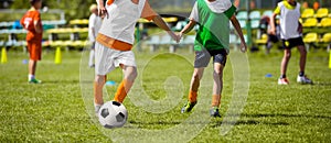 Children Training Soccer. Young Boys Playing Football Match