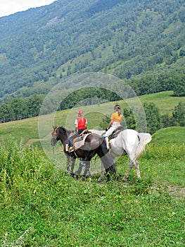 Children traveling in Altay mountains photo