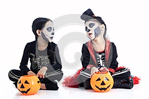 children trick or treating on white background