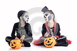 children trick or treating on white background