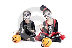 children trick or treating on white background