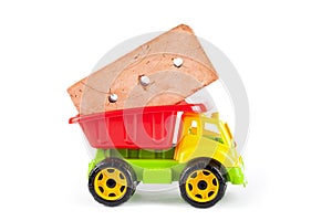 Children truck with red brick