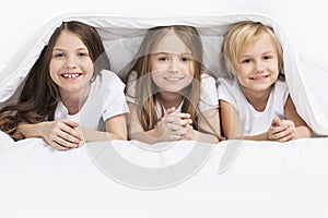 Children under blanket