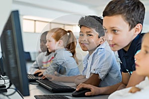 Children using computer in school