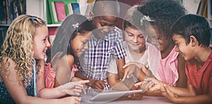 Children using digital table in library