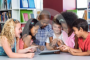 Children using digital table in library