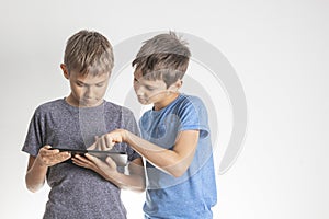 Children using digital tablet pc computer. Technology, online learning, education, distance learning, game apps for kids