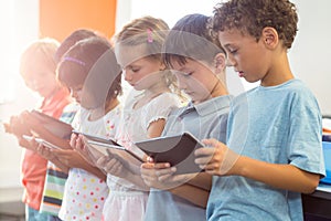 Children using digital tablets