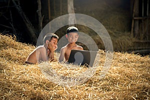 Children using laptop computer.