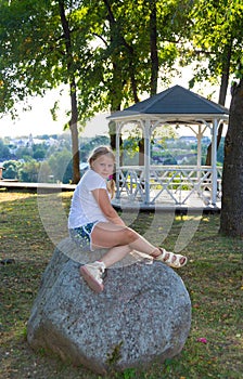 Children walk in the park `Love and Fidelity`. Historically restored park, in the style of the 19th century, on the high bank of