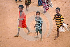 Children walking with bare feet