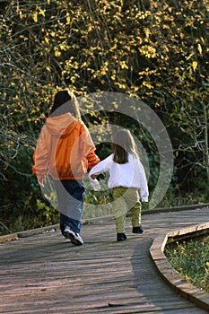 Children walking hand in hand