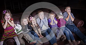 Children watching Shocking Television Programming