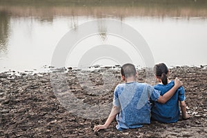 Children and water on arid soil in hot.