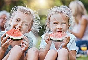 Children, watermelon and friends on a picnic in nature eating healthy fruit in a fun portrait outdoors in summer. Smile