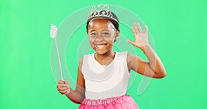 Children, wave and wand with a girl on a green screen background in studio playing fantasy or dress up. Portrait, kids