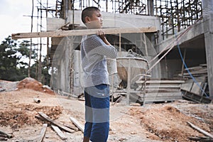 Children who work hard on the construction site, child labor , World Day Against Child Labour concept