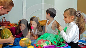 Children and woman preparing for halloween