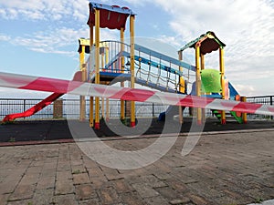 Children's playground closed and cordoned for covid-19 photo