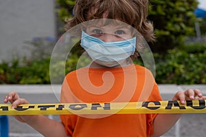 Children and Yellow Caution USA Tape of COVID-19. Closed playgrounds. Coronavirus Outbreak of Quarantine Area, Infection