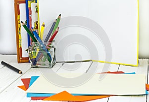 Childrens creativity, pencils, scissors, colored paper