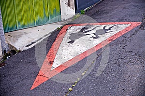 `Childrens going to school` sign on the asphalt