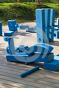 childrens playground in park with blue giant geometric figures f